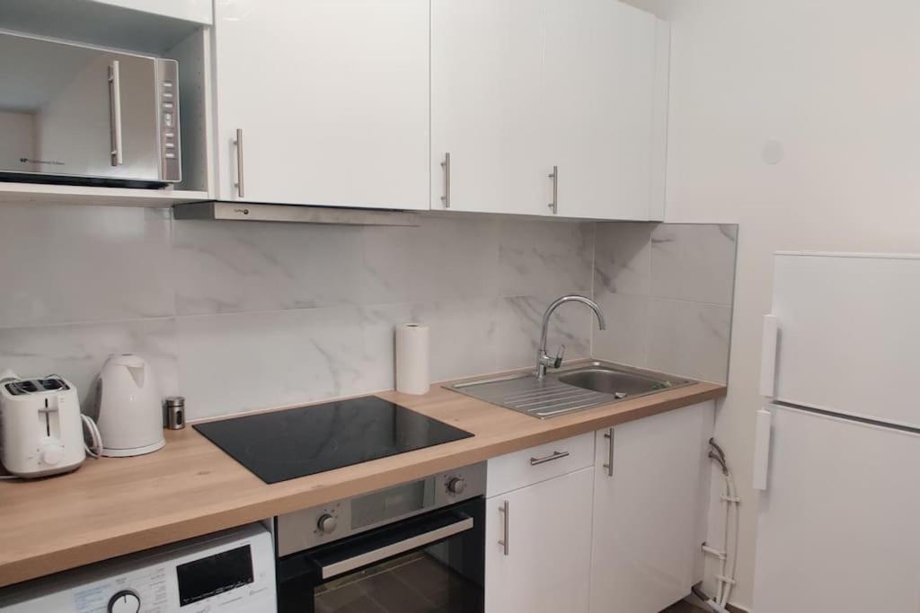 Appart Cosy Auber Porte De Paris Обервил Екстериор снимка